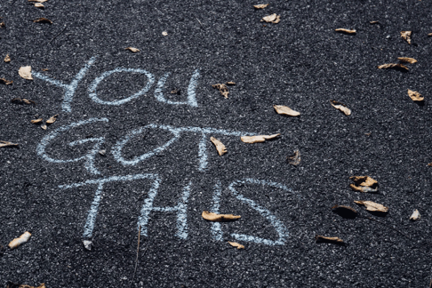 word written in chalk "You got this"